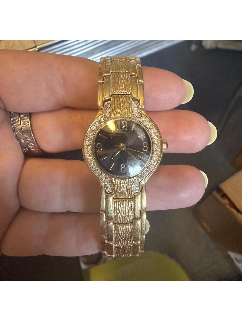 Gold Tone Ladies Wristwatch with Rhinestone Bezel and Black Dial